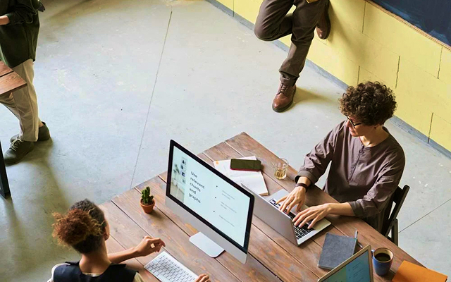 People working and enjoying coffee